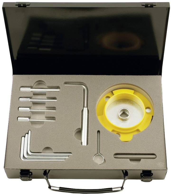 A black case with foam lining contains various tools, including Allen keys and a yellow rotary cutter.