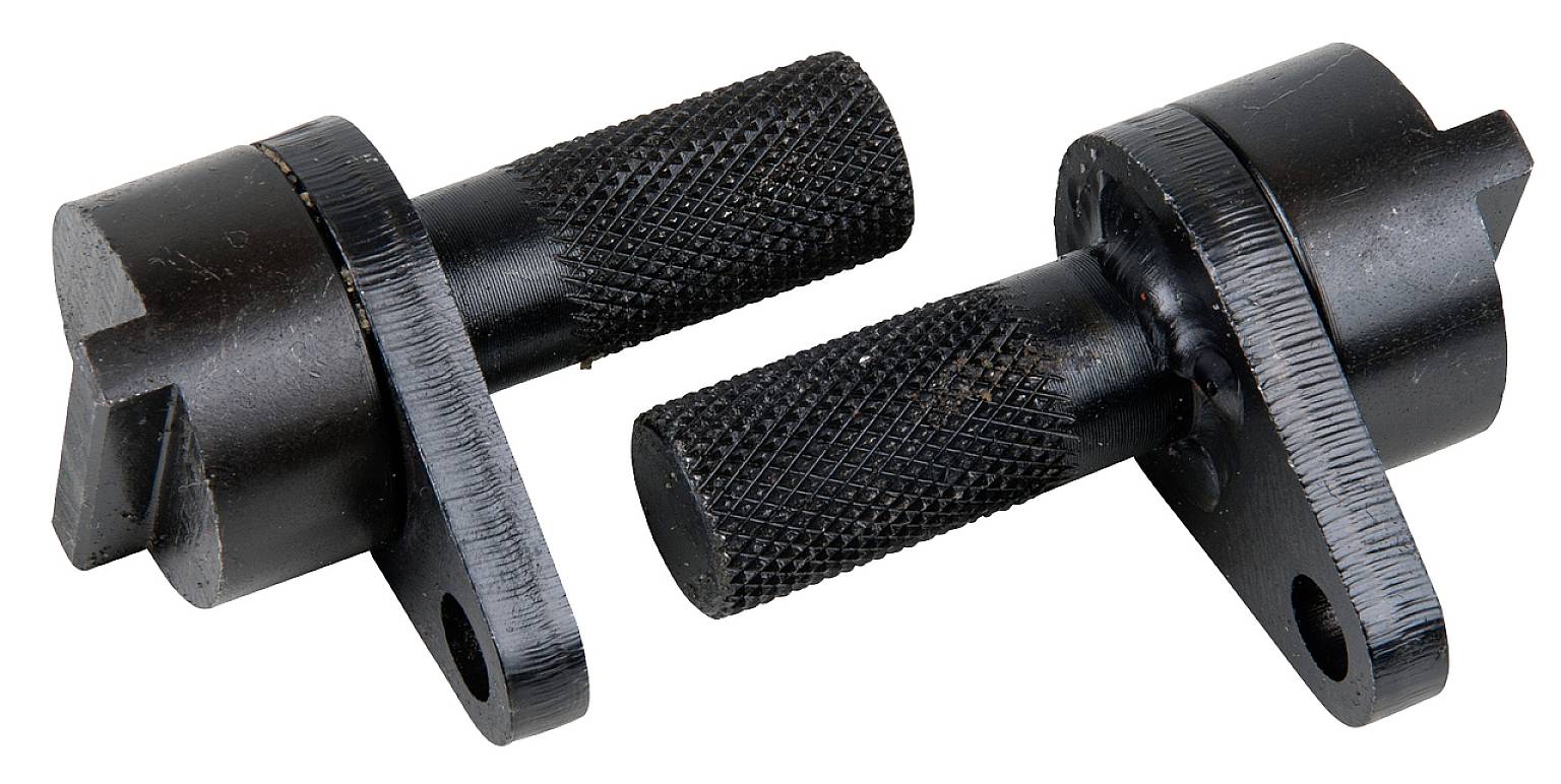 Two black metal bolts with knurled surfaces and mounting holes, which may be used for mechanical applications.