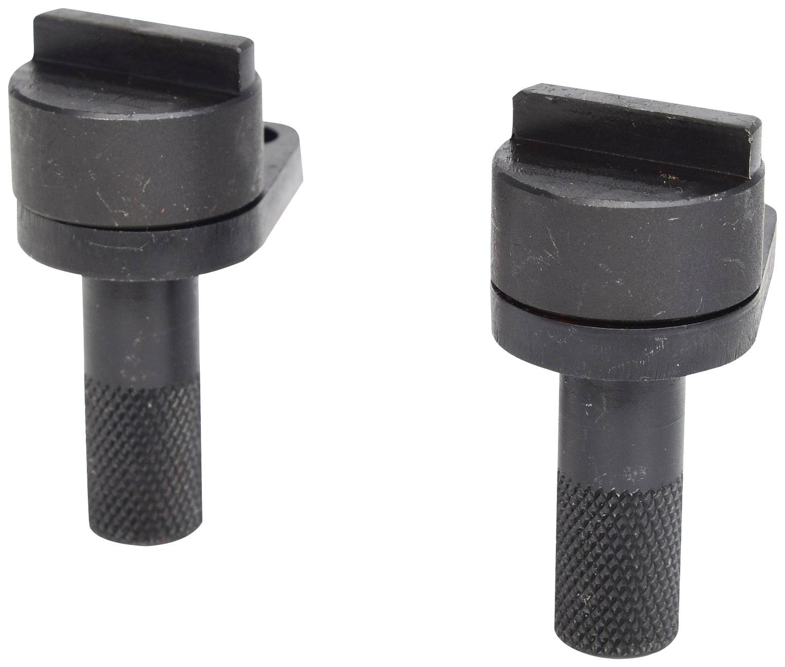 Two black, cylindrical metal tools with knurled handles and flat heads, standing side by side.