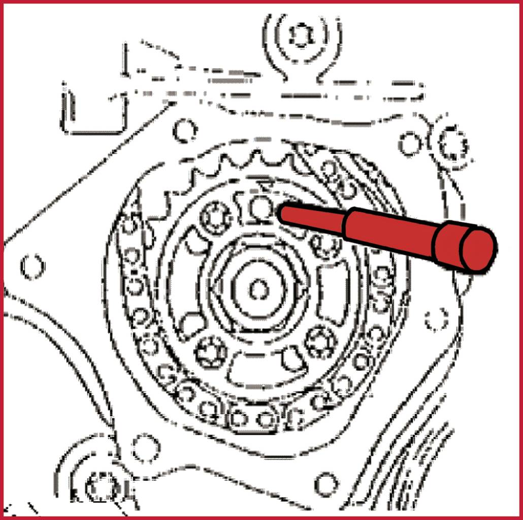 Mechanical gear system with a red pin marking a gear wheel. Indicates focus on internal components or repair guidance.