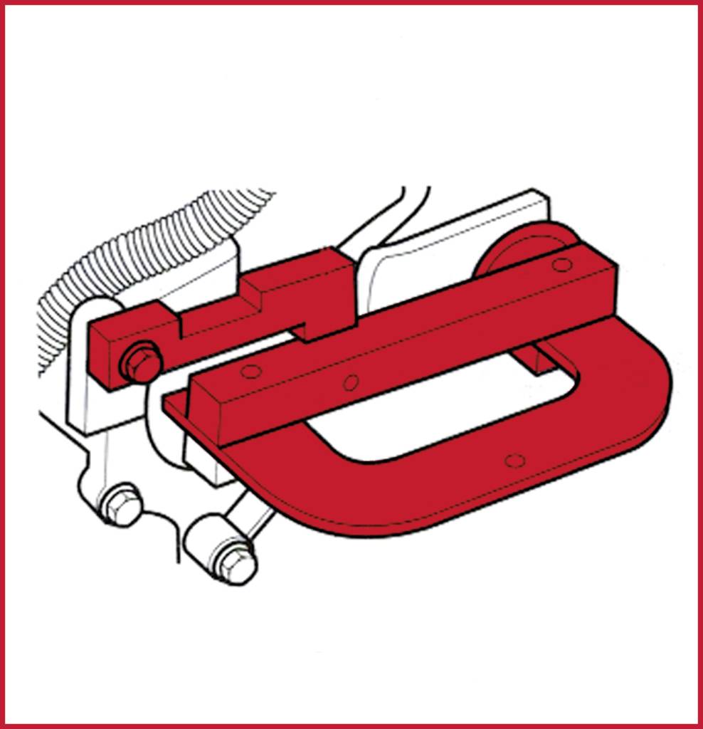 A red clamp tightens a screw. The diagram shows how the tool is attached to a mechanical component.