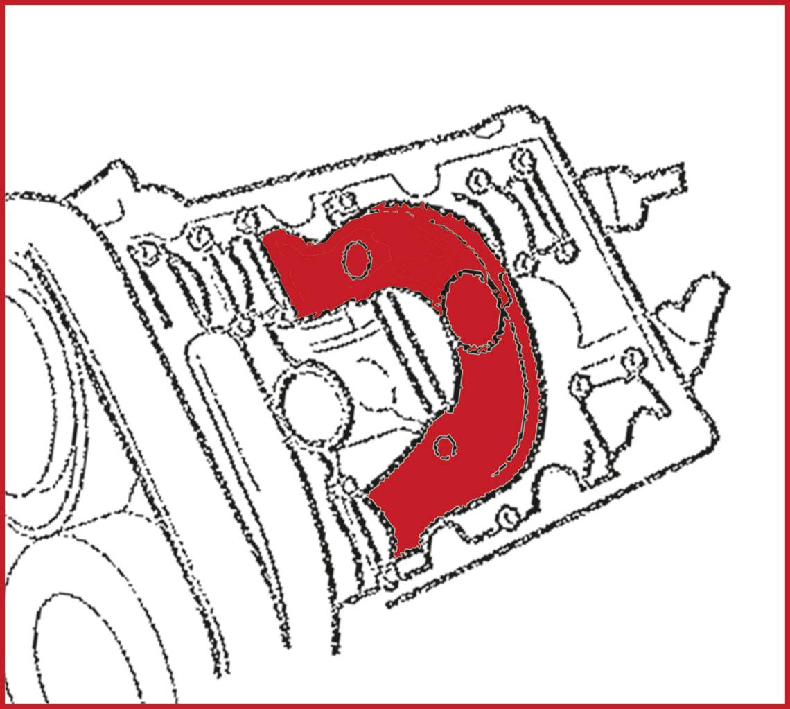 Part of an engine with a highlighted red section. The red part is visible in a cross-section, presumably for technical analysis.