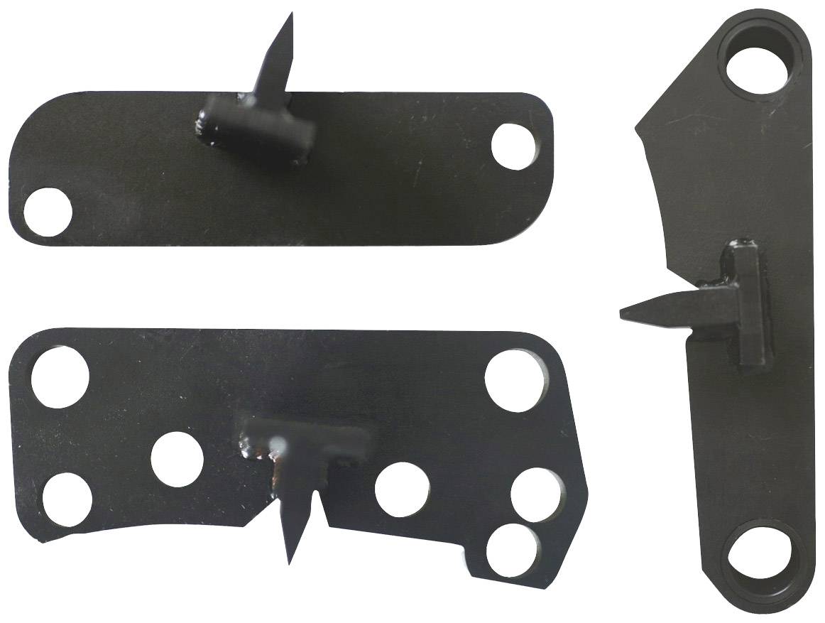 Three black metal plates with different shapes and openings, each with a small, raised section on the surface.