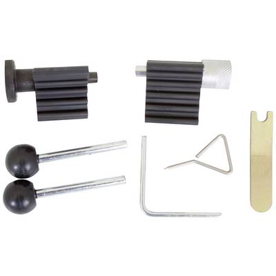A repair kit with two black tension rollers, two metal pins, an L-shaped key, a triangular tool, and a flat metal plate.