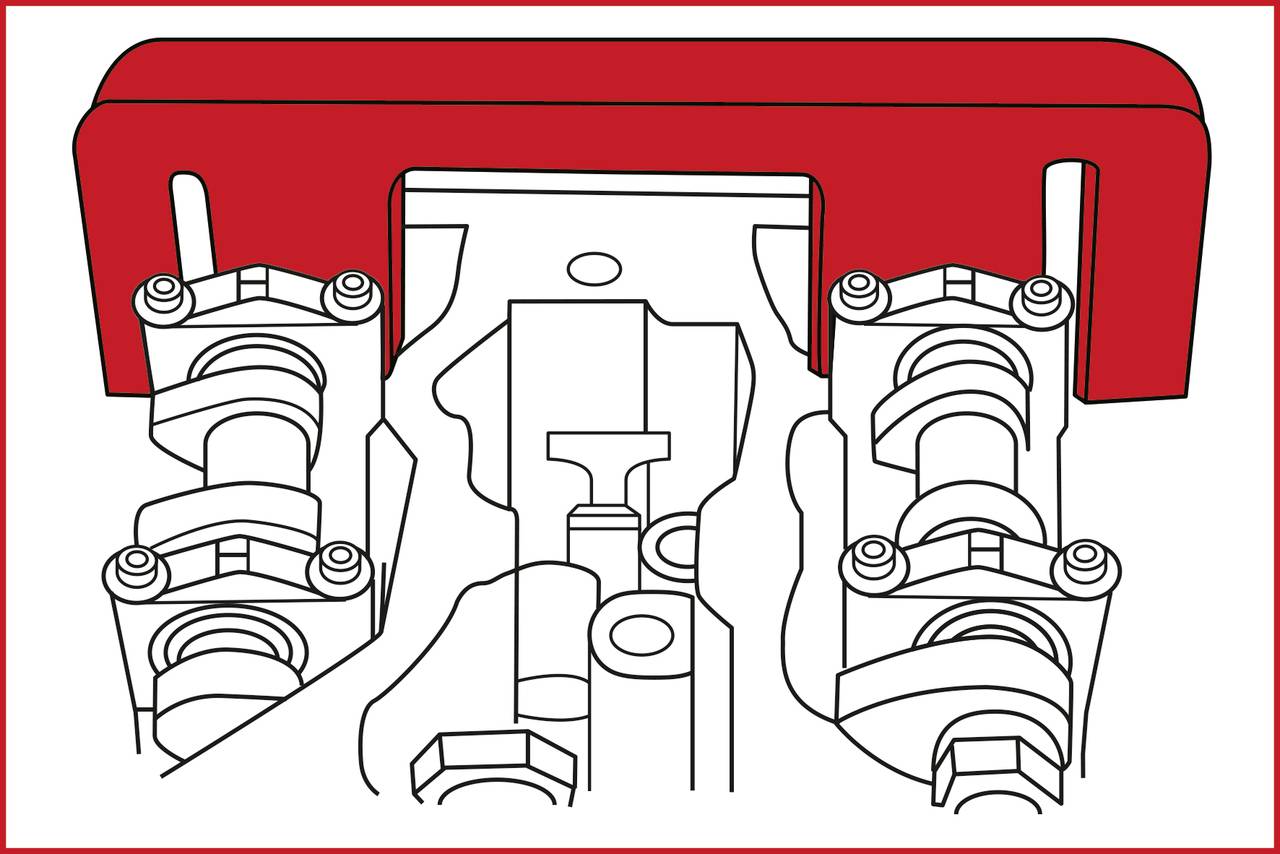 A technical drawing shows a camshaft with two cams, surrounded by a red cover.