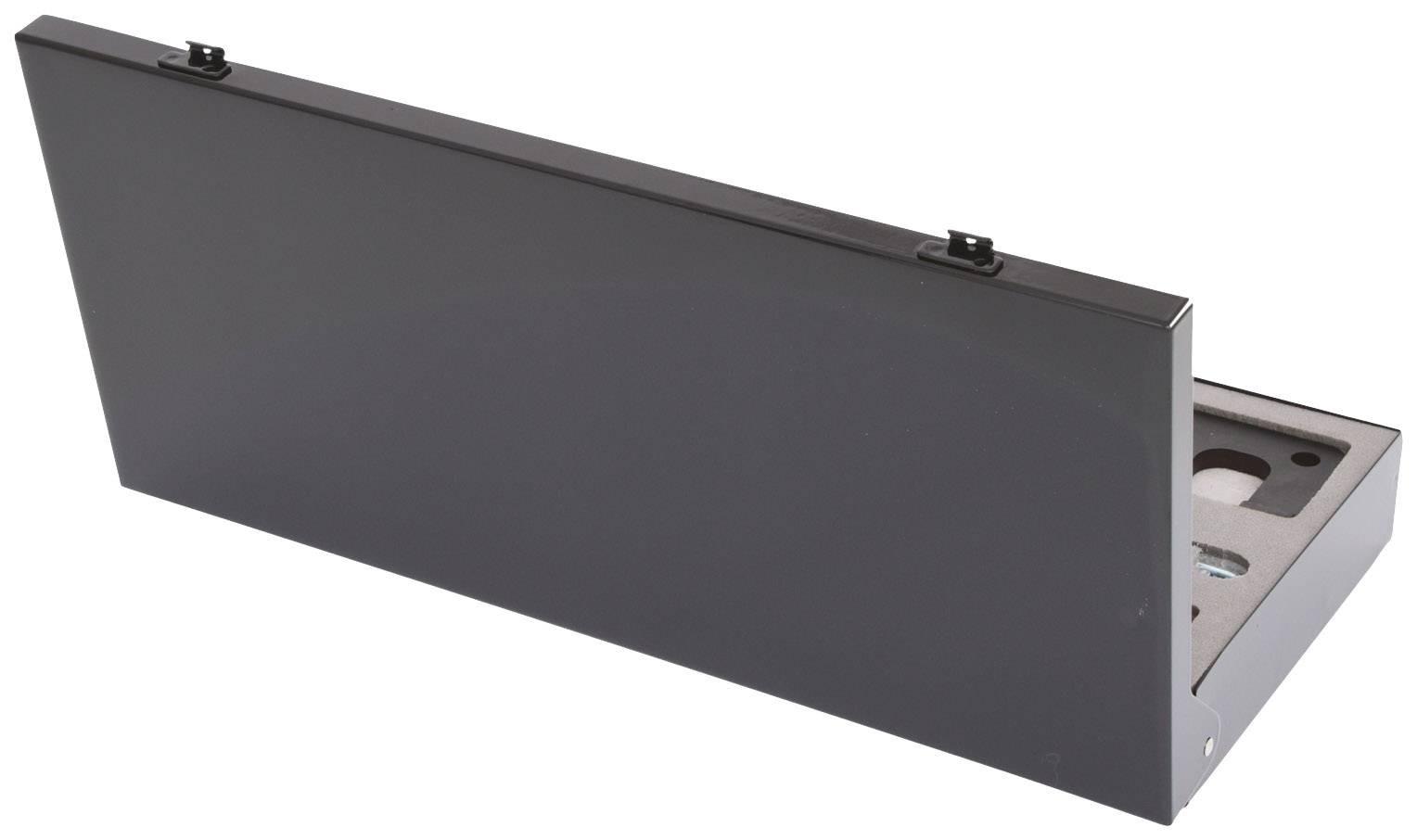 A black, rectangular container, opened to reveal internal compartments. Contains recesses for various items.