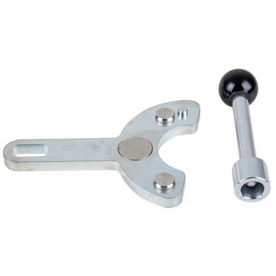 Metal tool with a handle and two moveable parts; likely used for holding or turning cylindrical objects.<br><br>(Note: This translation already appears to be in British English, as it uses standard terminology and spelling.)