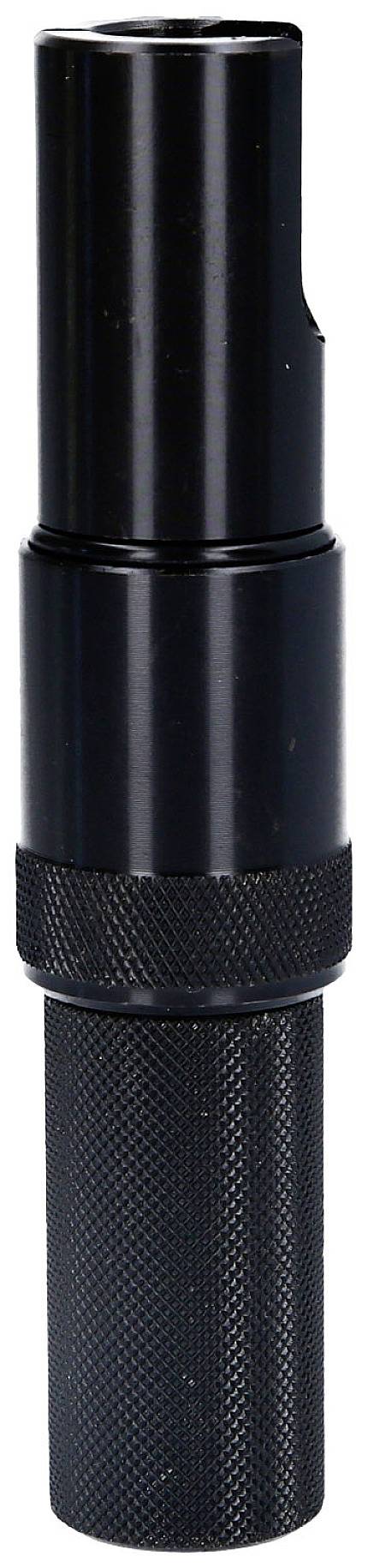 A black metal adapter with a cylindrical design, used for technical applications, stands vertically against a white background.