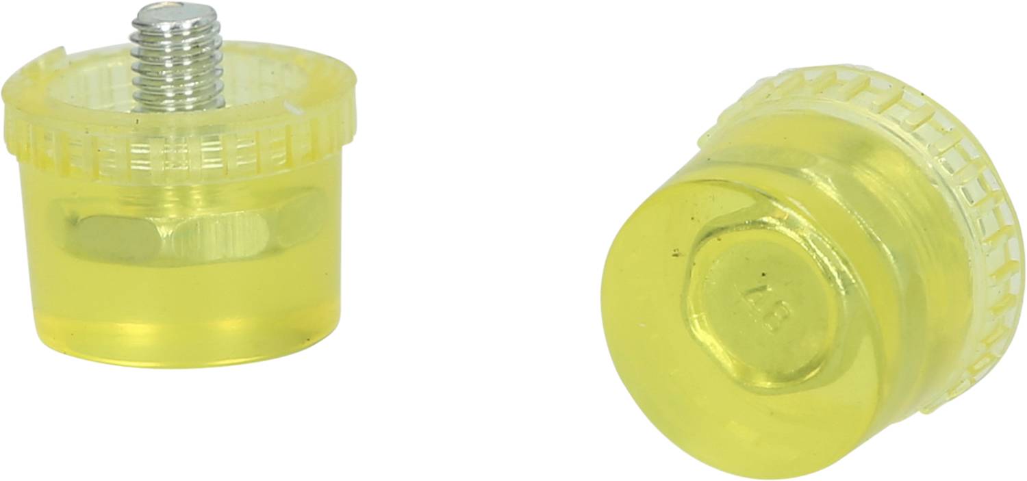 Two yellow plastic caps, one with a screw thread and the other sealed. They are cylindrical and transparent.