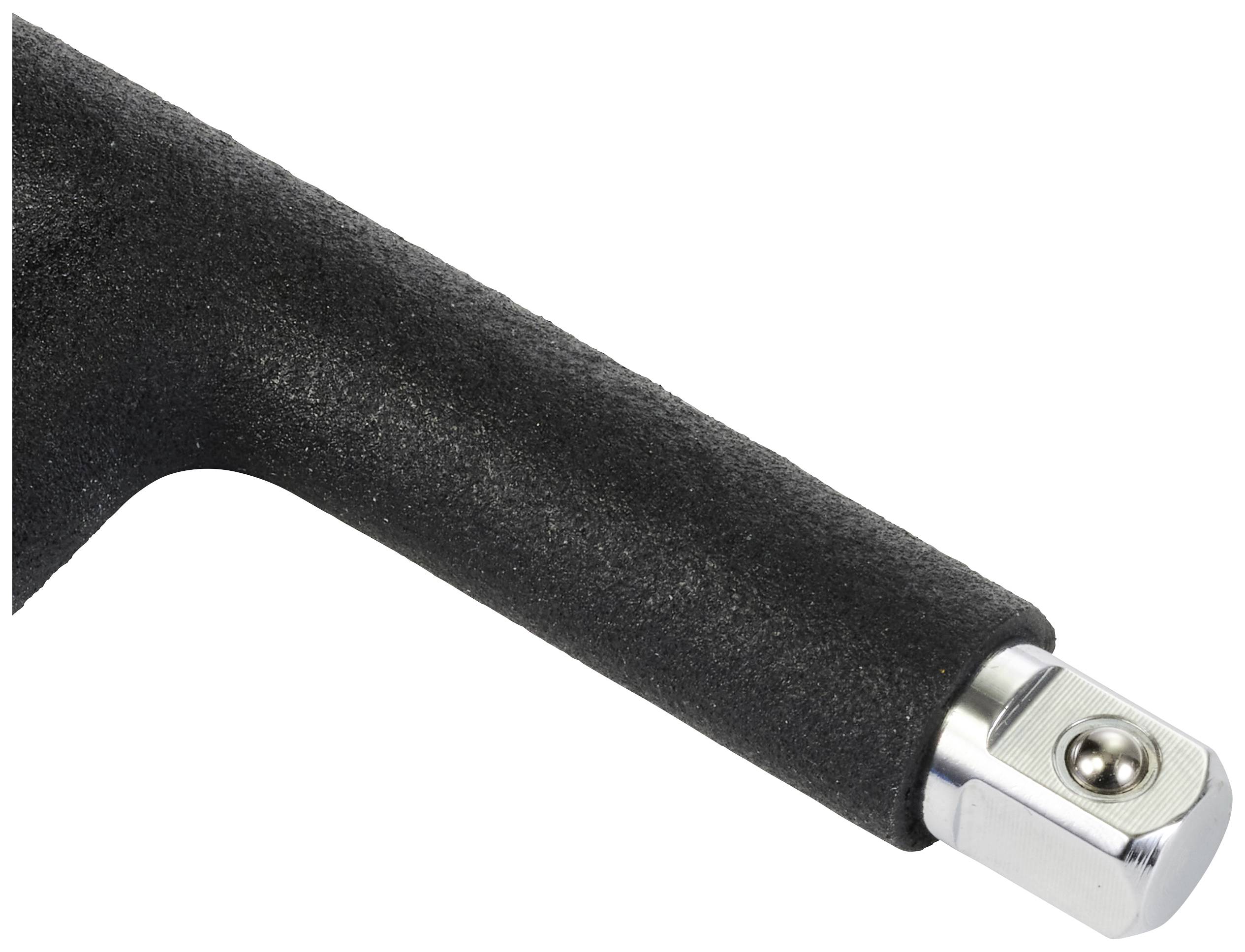 Close-up of a black handle with a metallic cap and screw at its tip.