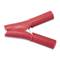 A red battery terminal clip is open and lying on a white background.