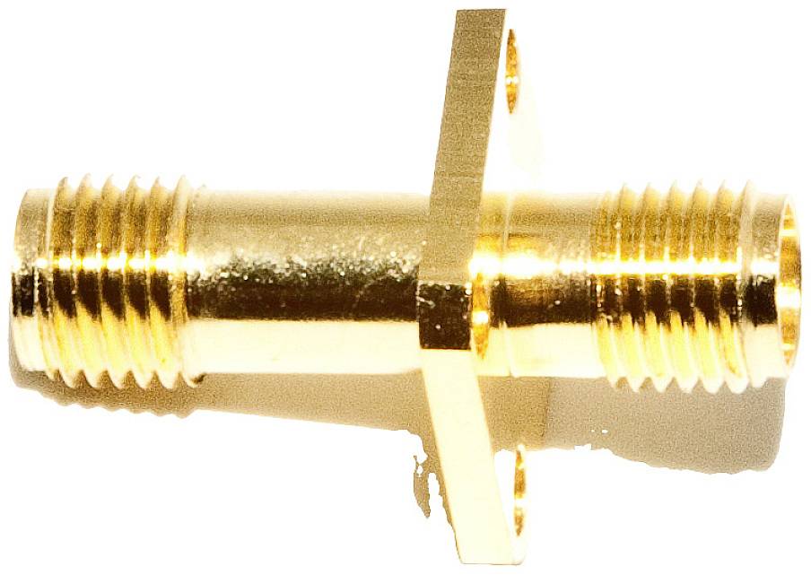 A golden, cylindrical adapter with threading on both ends, suitable for connecting two cables or devices.