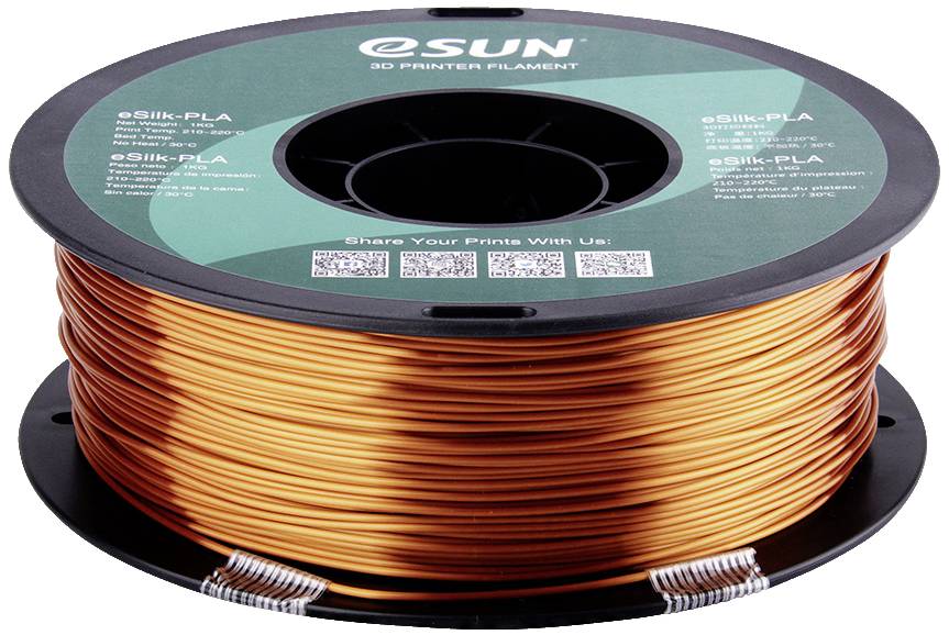 A spool of copper-coloured 3D printer filament by the brand eSUN. The label displays information about the material type eSilk-PLA.