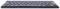 A black wireless computer keyboard viewed from the front. The keys are compactly arranged.