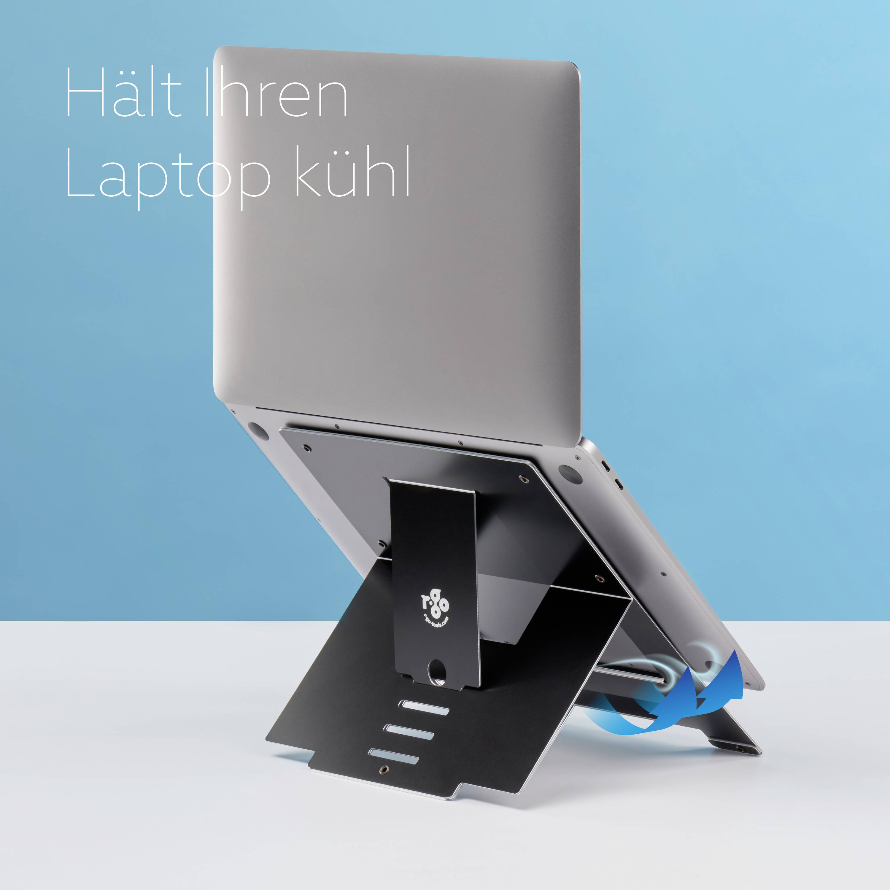 A silver laptop on a black stand that slightly tilts the laptop. Text: 'Keeps your laptop cool'.