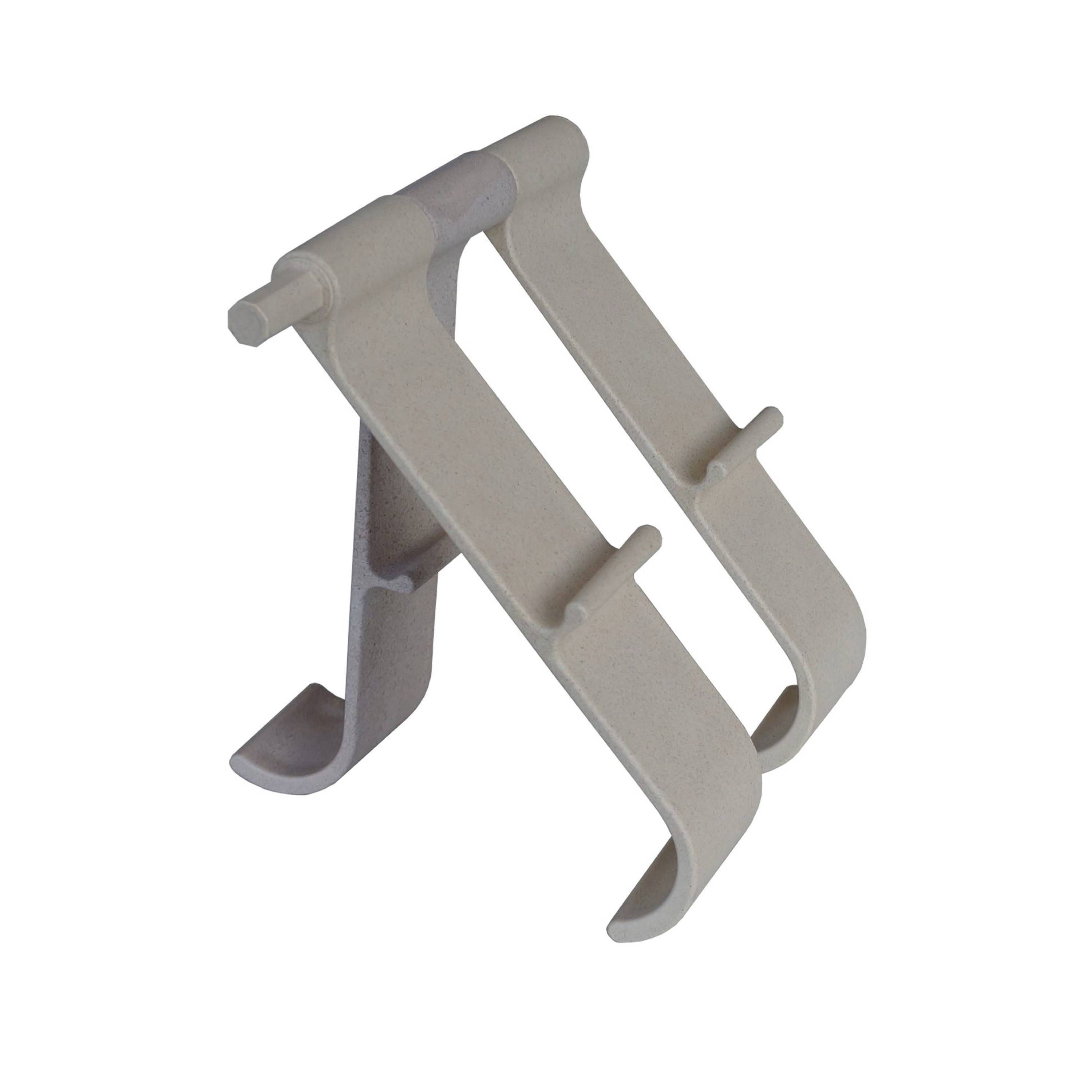 A white, foldable laptop stand made of plastic with two crossed supports to provide a stable base.