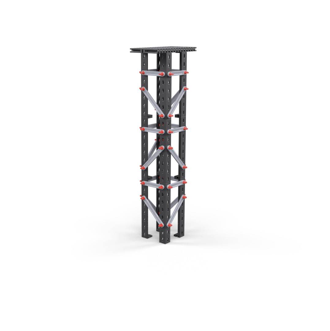 A tall, slender tower made of black building blocks with red connecting pieces, set against a white background.