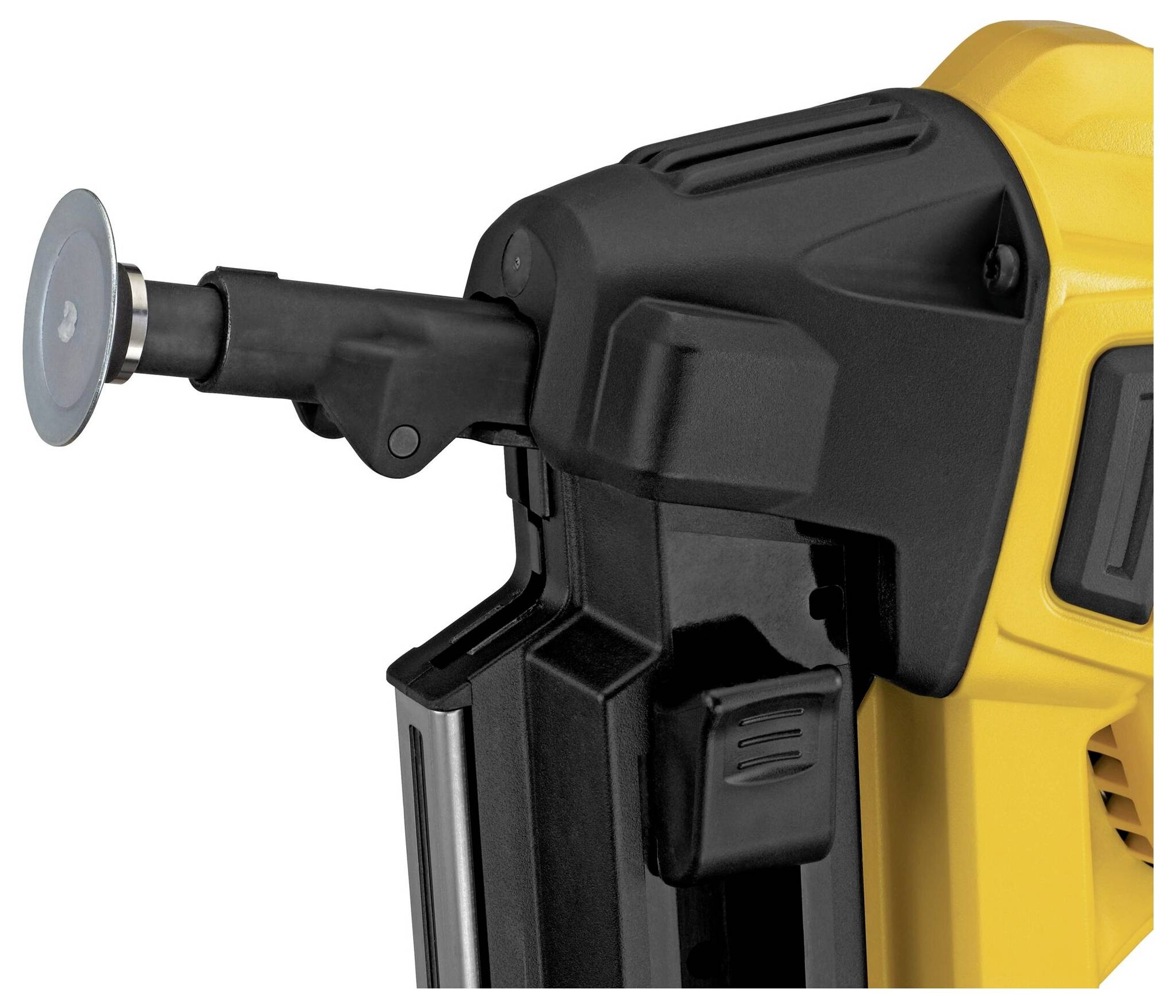 Close-up of a yellow nail gun with a suction lever attachment at the tip. Device used for construction and woodworking.