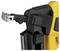 A close-up of a yellow battery-powered nail gun with a protruding nail and ergonomic handle.