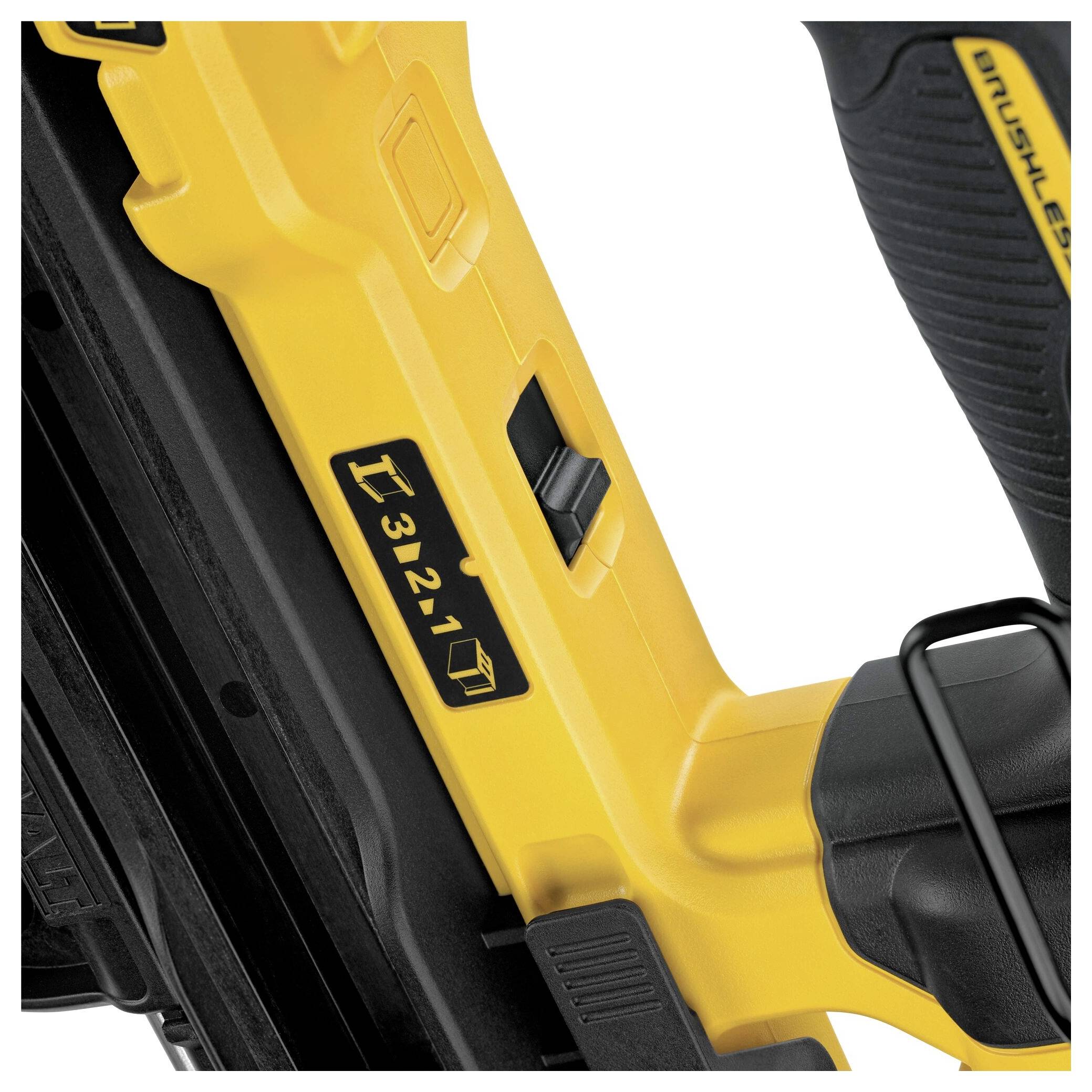 A close-up of a yellow power tool with the inscription '321' and a symbol representing a battery.