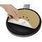 'A hand removes the sandpaper marked P120 from a circular sanding disc.'