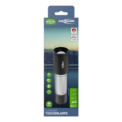 'Ansmann Torch' on packaging. Features: 95 m range, 3-year warranty, 275 lm brightness. Background: City at night.