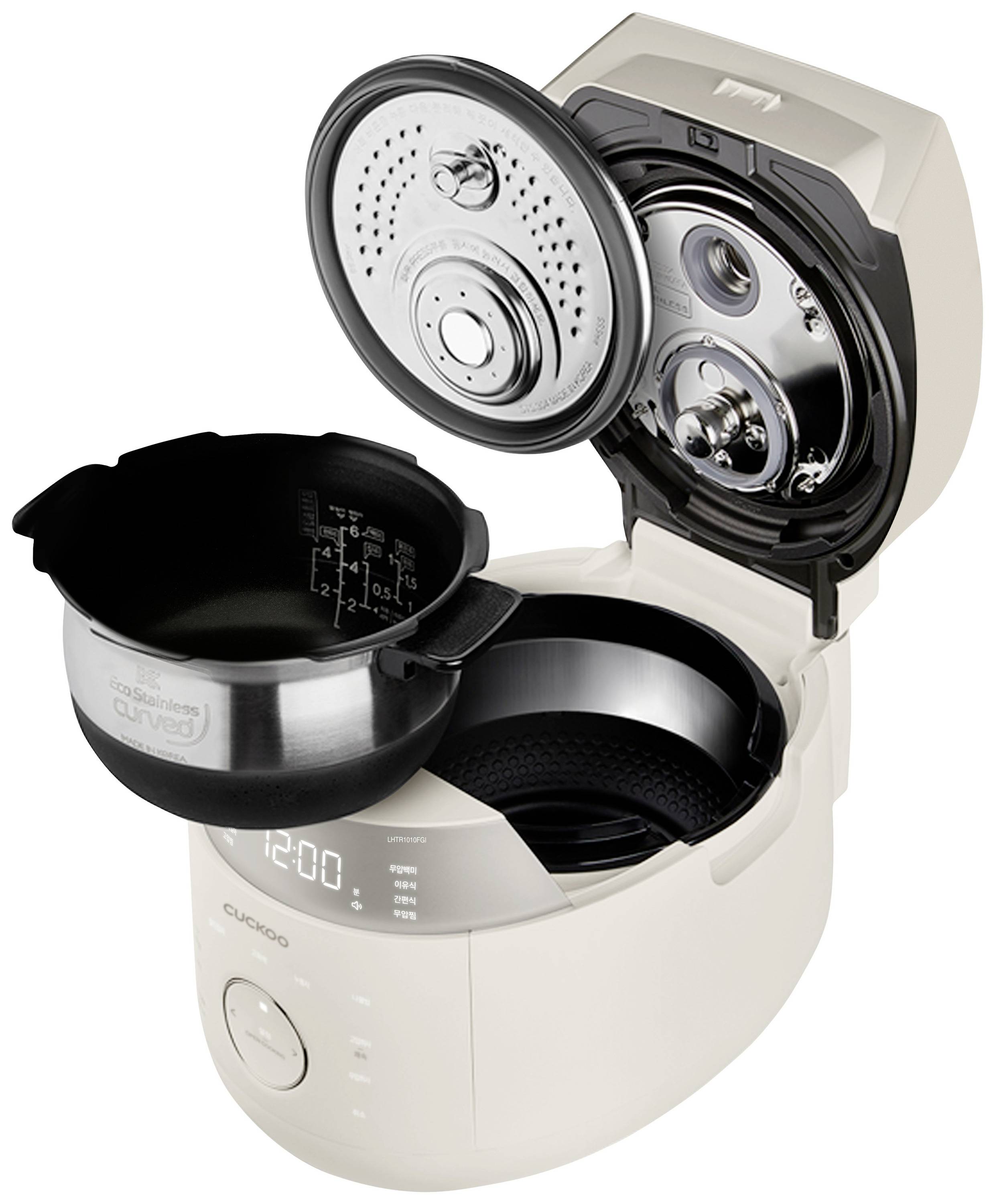 An electric rice cooker with its lid open reveals the removable inner pot and the control panel with a digital time display.