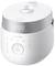 Electric rice cooker with digital display and cooking programmes on the front panel.