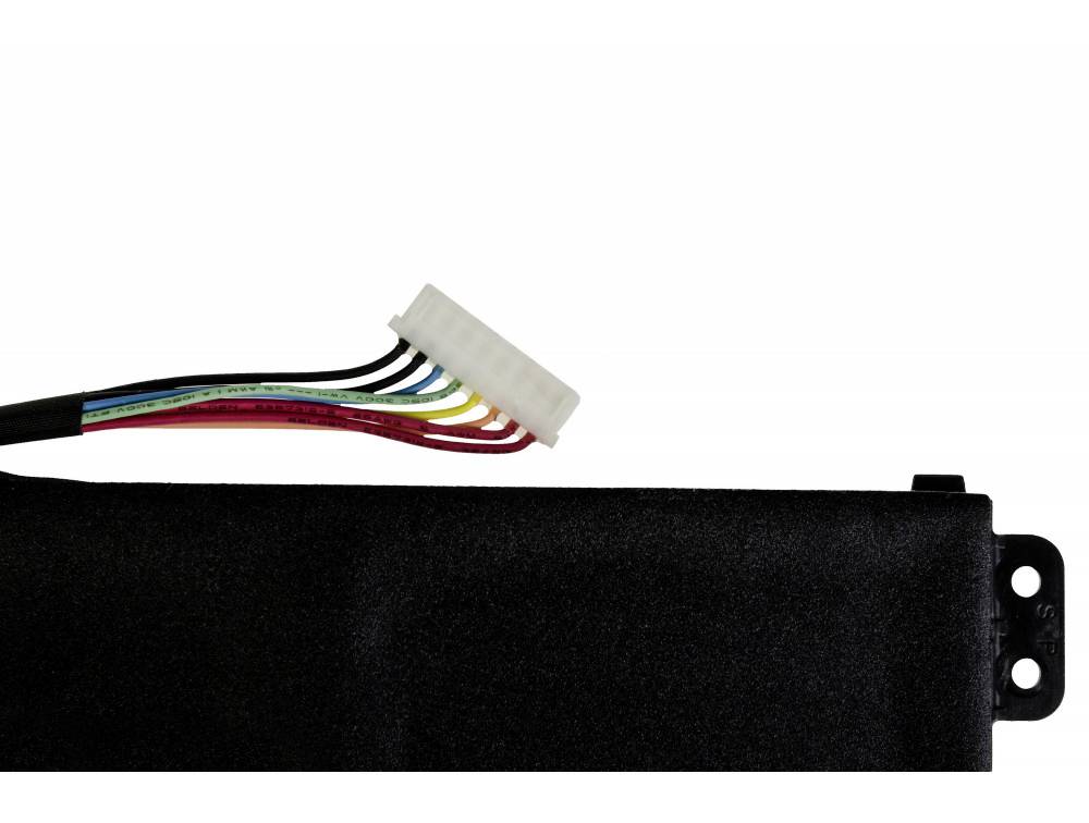 A part of a black device with a white plug, from which several colourful wires protrude.
