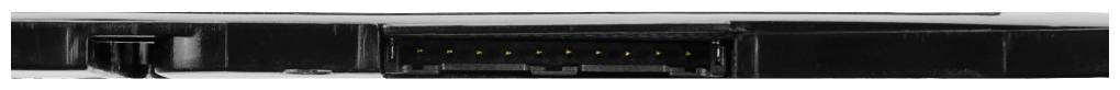 A closed black laptop, viewed from the side, shows the ports and hinge.