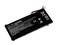 Laptop battery with technical specifications and warning notices on a black surface; various safety and recycling symbols visible.