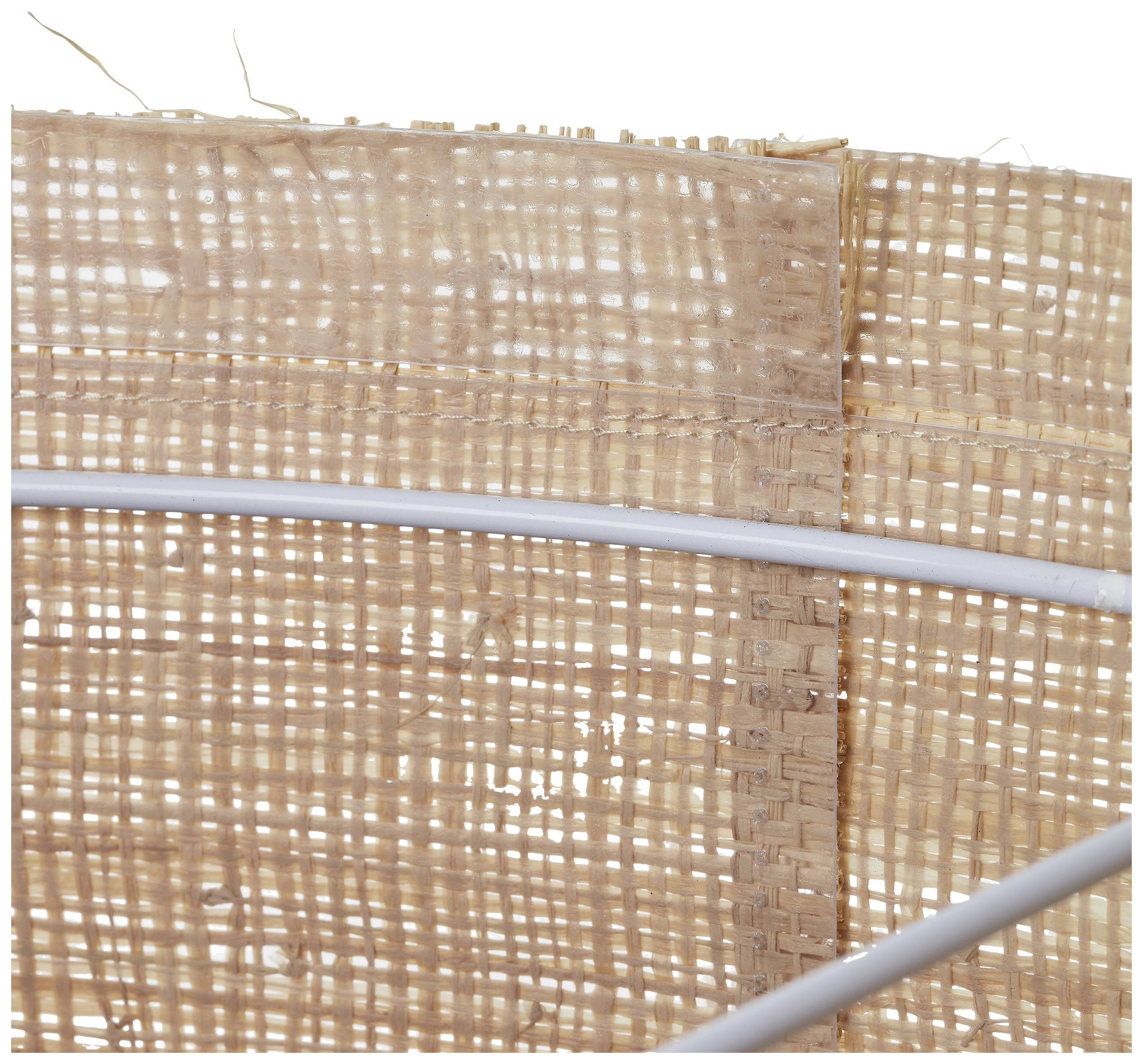 Close-up of plaited straw with a white, curved wire in front. The straw is light brown and the wire reflects light.