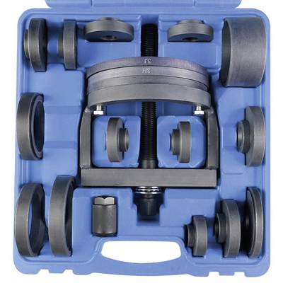 Tool set for assembly and disassembly of wheel bearings, consisting of metal rings and screw tools, in a blue case.