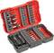 An open, red toolbox with various socket wrenches and bits. Suitable for different repair tasks.