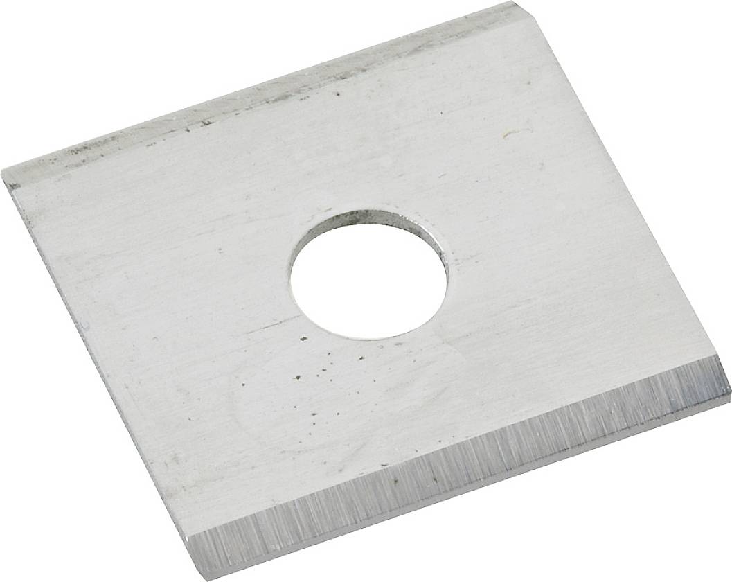 A square metal blade with a hole in the centre, sharp edge at the bottom.