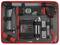 Tool set with spirit level, screwdriver, tape measure, hexagonal key, blades, brush, craft knife and bits organised in a black and red case.