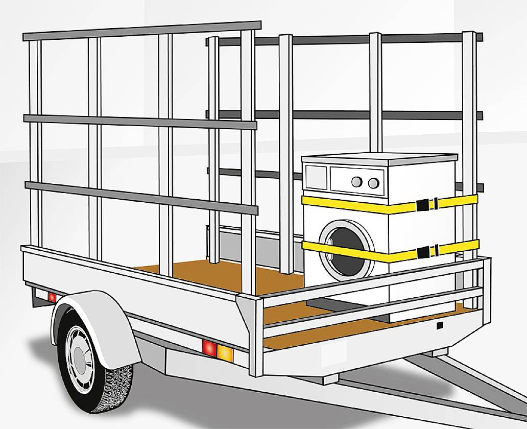 A trailer loaded with a washing machine, secured with yellow straps, is ready for transportation.