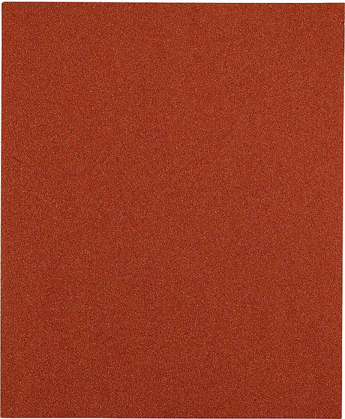 A rectangular piece of red sandpaper with coarse grit is shown against a white background.