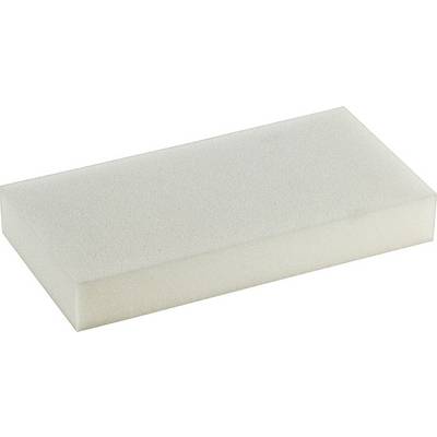 A white rectangular sponge is lying on a flat surface. The sponge has a fine, uniform texture.