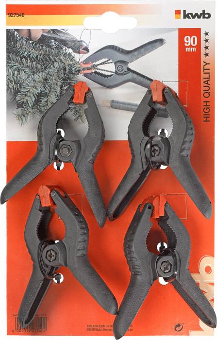 'Kwb' packaging with four black plastic clips, each 90mm. Background shows a clip in use securing branches.