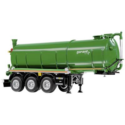 Green tanker lorry on three axles, side view. The vehicle has the inscription 'garant'.