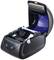 Open label printer with blue interior casing, ready for label paper to be inserted.
