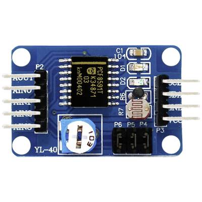 'Electronic module with a black IC in the centre, surrounded by capacitors, resistors, and connectors on a blue circuit board.'