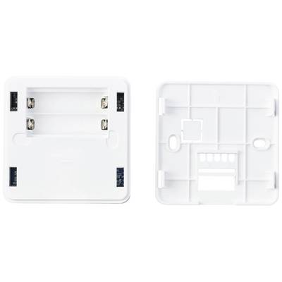 Two white plastic plates side by side. On the left with battery holders, on the right an empty plate with mounting holes.