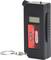 A digital pressure gauge with display and key ring by 'KS Tools', model number '100.4400'.