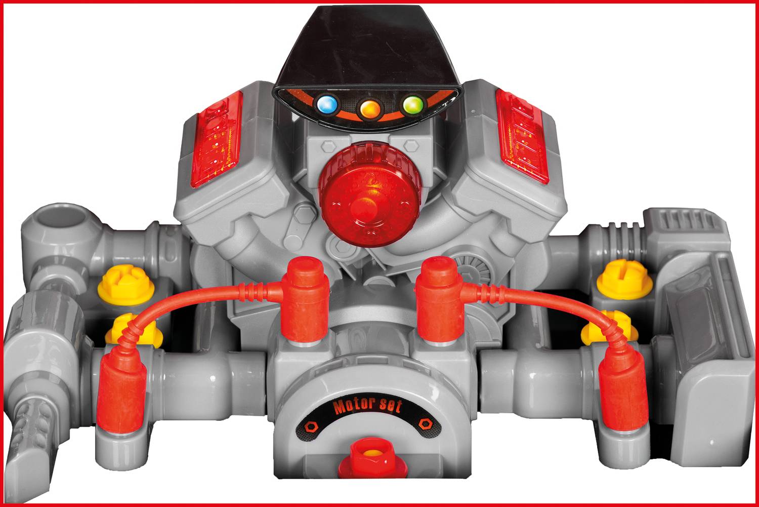 A grey and red toy spacecraft with prominent red and yellow elements and a central red dome.