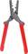 A pair of pliers with red handles, suitable for crimping or stripping cables.