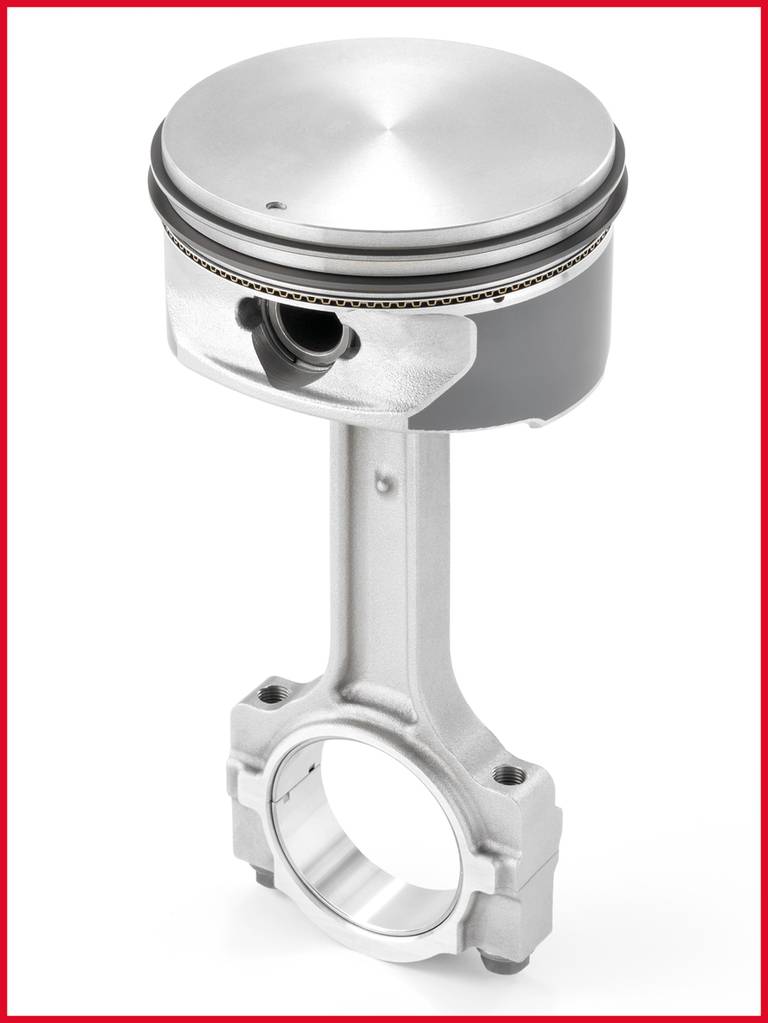 A piston with a silver metallic surface, connected to a connecting rod. The background is white.