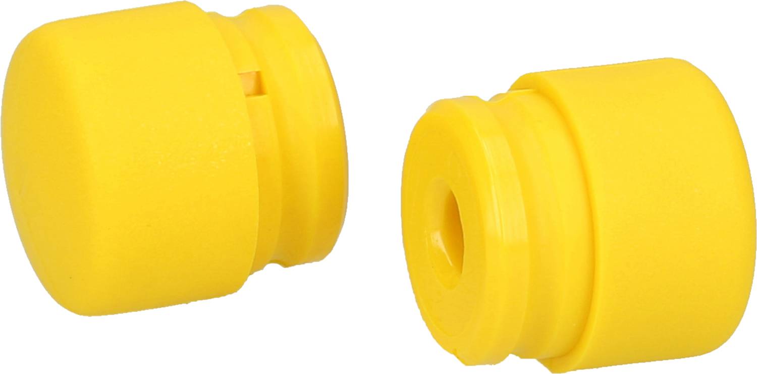 Two yellow, cylindrical objects with smooth surfaces lying side by side. They each have a slit and an opening.