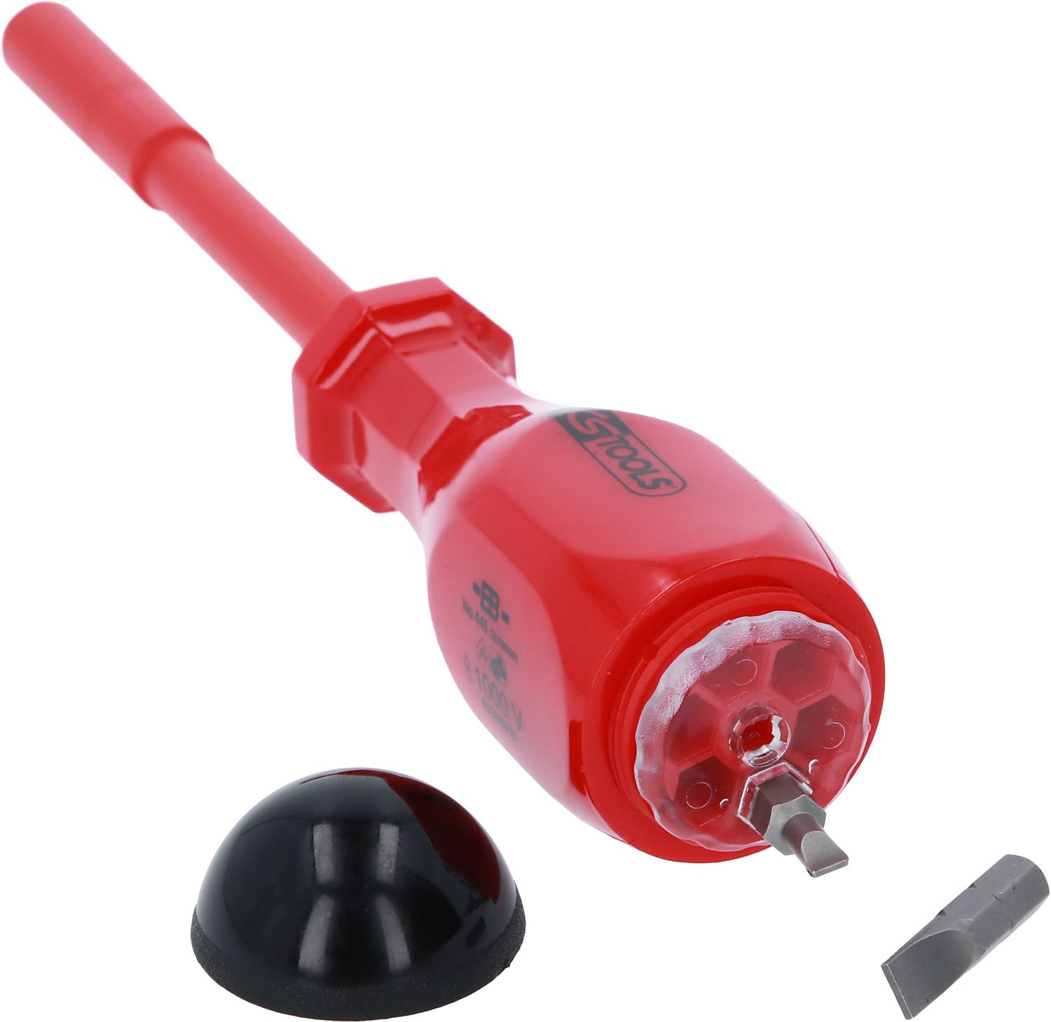 A red electric testing device with a plastic handle and a removable attachment. A black cap lies next to the device.